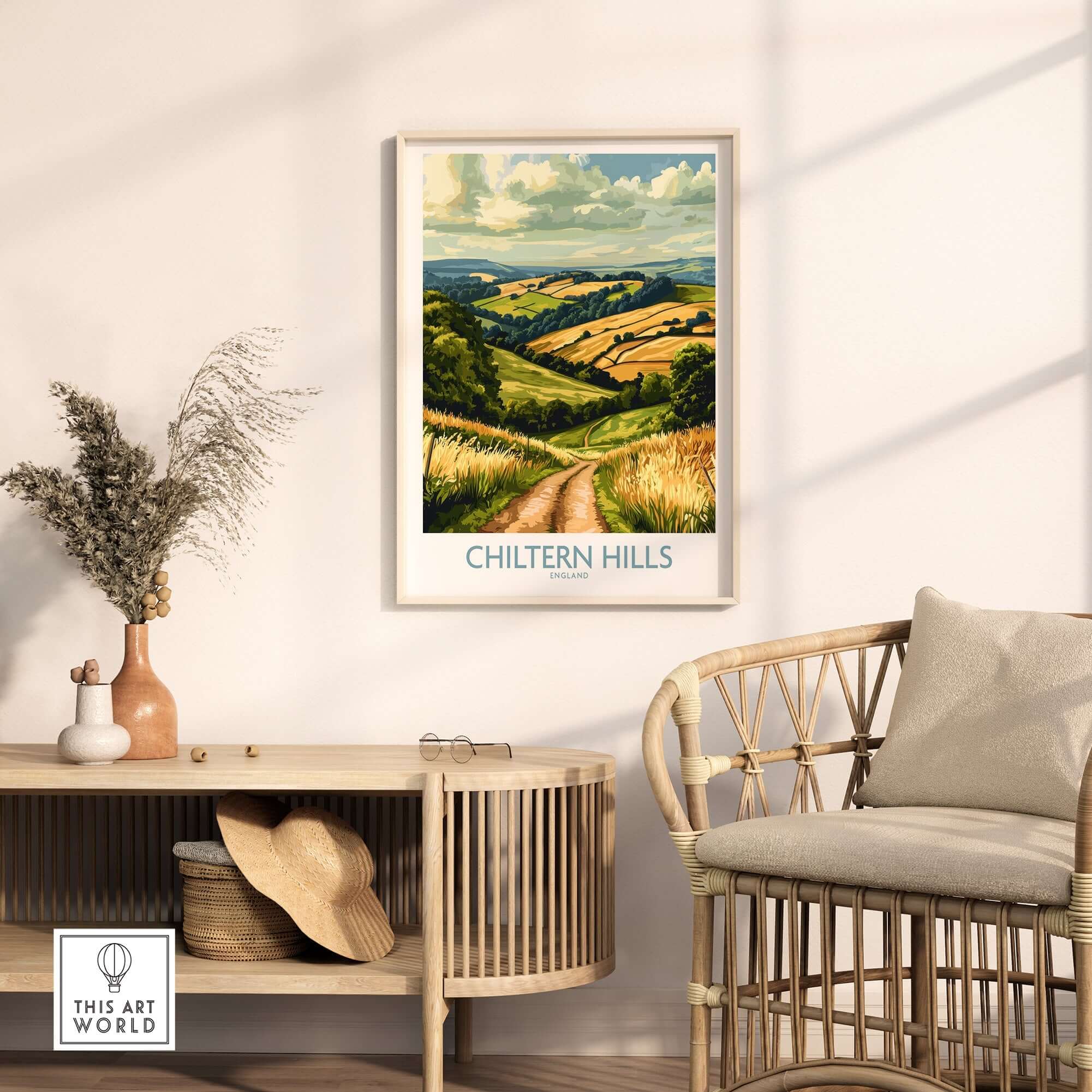 Chiltern Hills Wall Art Print displayed on a wall above a stylish rattan chair, capturing stunning natural scenery.