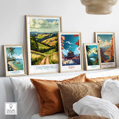Chiltern Hills Wall Art Print displayed among travel-themed prints on a stylish shelf.