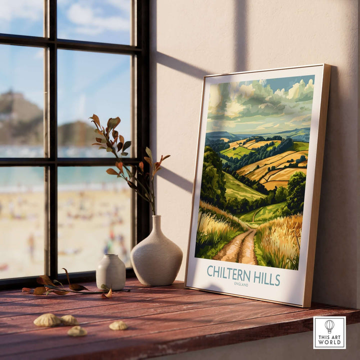 Chiltern Hills wall art print displayed on a windowsill, capturing the scenic beauty of the English countryside.