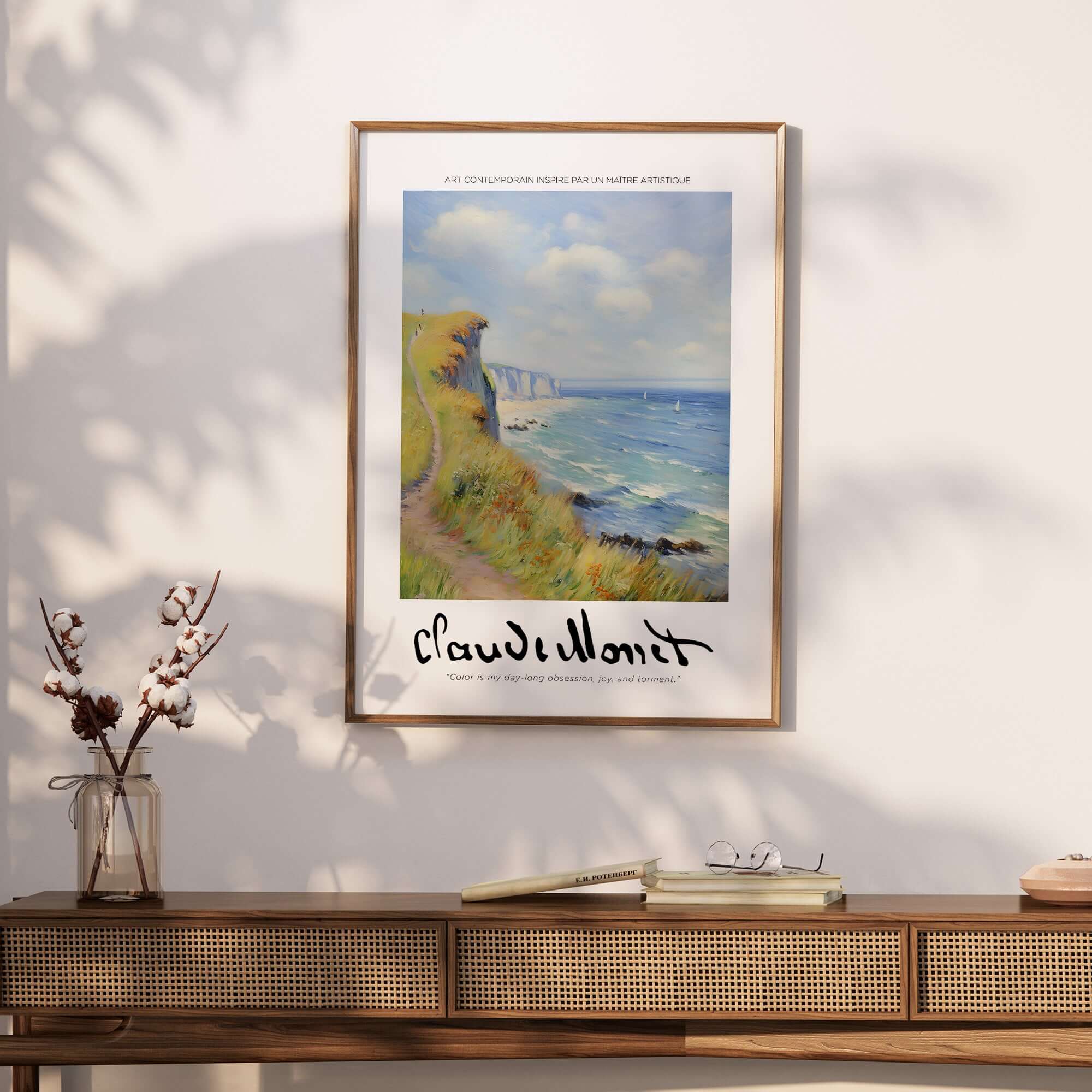 Claude Monet Art Print - Coastal Cliff Path Seascape Wall Art displayed on a wall next to a stylish console table.