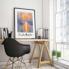 Claude Monet Art Print - Impressionist Sunrise Harbor Wall Art displayed in a modern home office setting with a desk.
