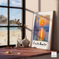 Claude Monet Art Print - Impressionist Sunrise Harbor Wall Art displayed in a bright room by a window.