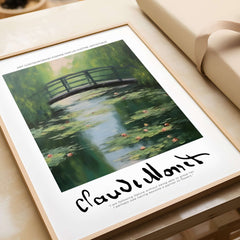 Claude Monet Art Print - Japanese Bridge Monet Water Lilies Print - Garden Pond Wall Art in a framed print on a table.