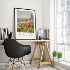 Claude Monet Art Print - Sunny Beach Resort with Flowers Poster displayed in a stylish home office setting.