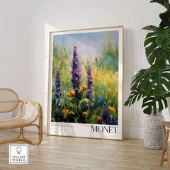 Claude Monet Art Print - Wildflower Meadow Purple Floral Print displayed in a stylish room with green foliage.