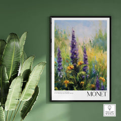 Claude Monet Art Print - Wildflower Meadow Purple Floral Print displayed on a green wall, featuring vibrant purple flowers.