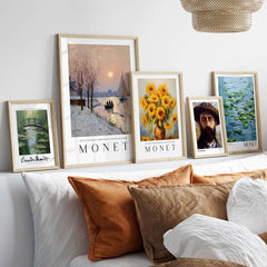 Claude Monet Poster - Winter River Sunset Wall Art - Snow Scene Print displayed on a wall above a cozy sofa.