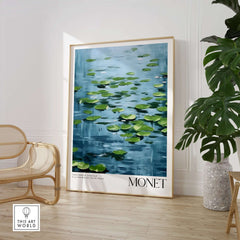 Claude Monet Print - Calm Lily Pads on Blue Water Wall Art in a bright room with plants and seating.
