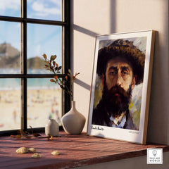 Claude Monet Self Portrait Wall Art - Impressionist Poster Print displayed on a wooden table near a sunny window.