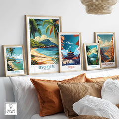 Coastal Elegance: Seychelles Beach Art Print displayed among other travel art prints in a cozy interior setting.