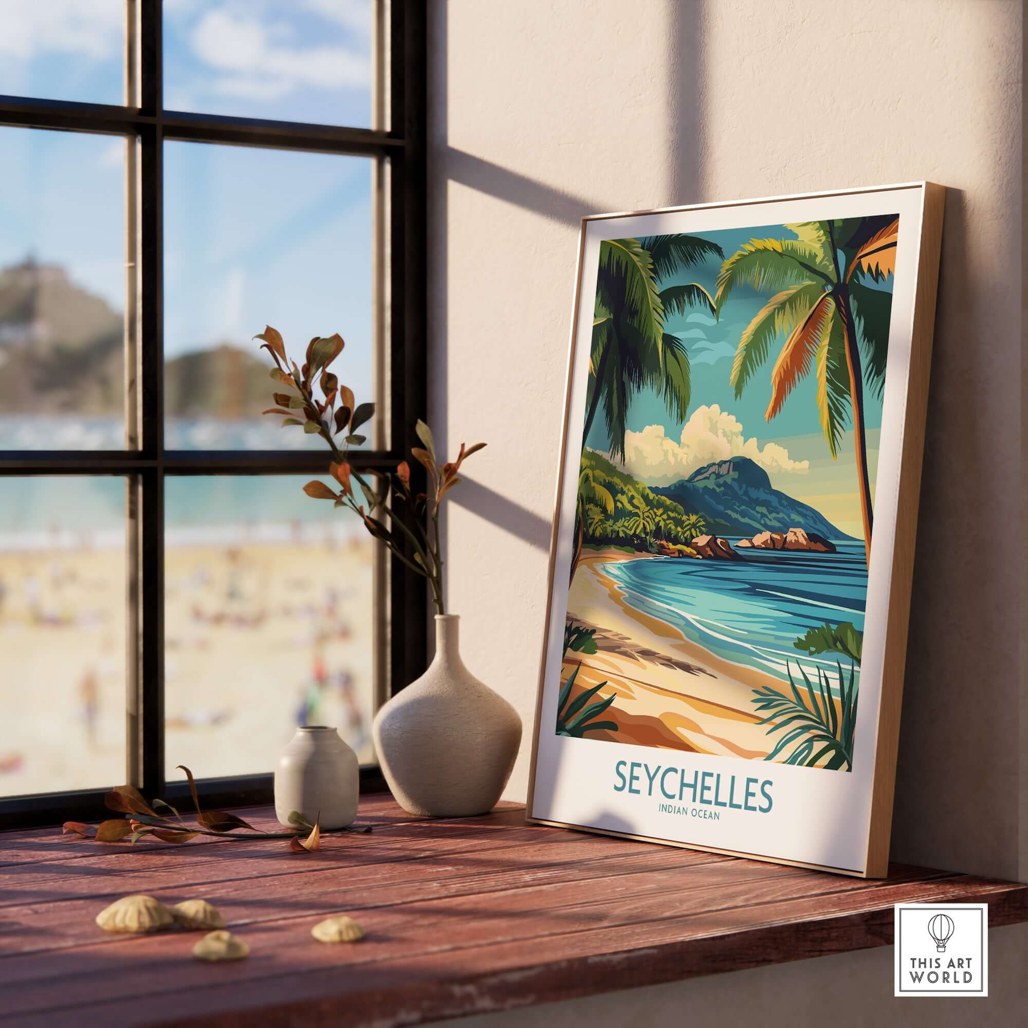 Coastal Elegance: Seychelles Beach Art Print displayed by a window, showcasing vibrant colors and serene beach scenery.
