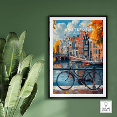 Colorful Amsterdam Canal House Poster - Classic Dutch Canal Scene Print displayed with green plant and black bicycle.