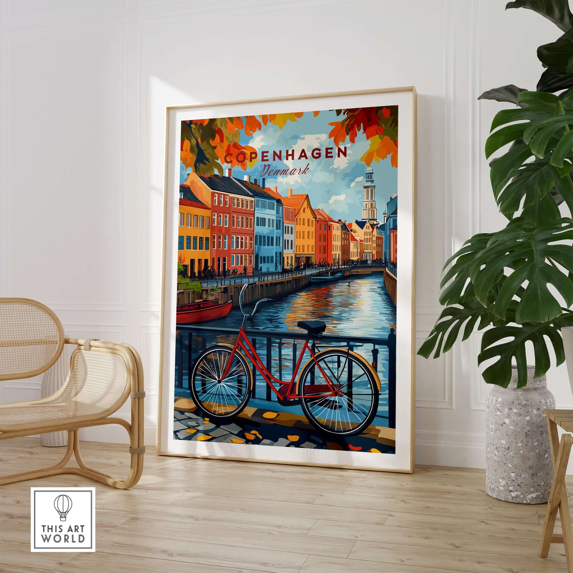 Copenhagen Autumn Art Print - Denmark Canal View, Red Bike Poster framed in a cozy room with plants and chairs