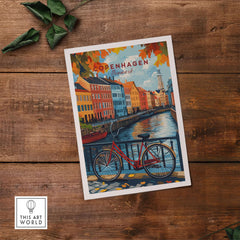 Copenhagen Autumn Art Print - Denmark Canal View, Red Bike Poster on wooden surface with leaves.