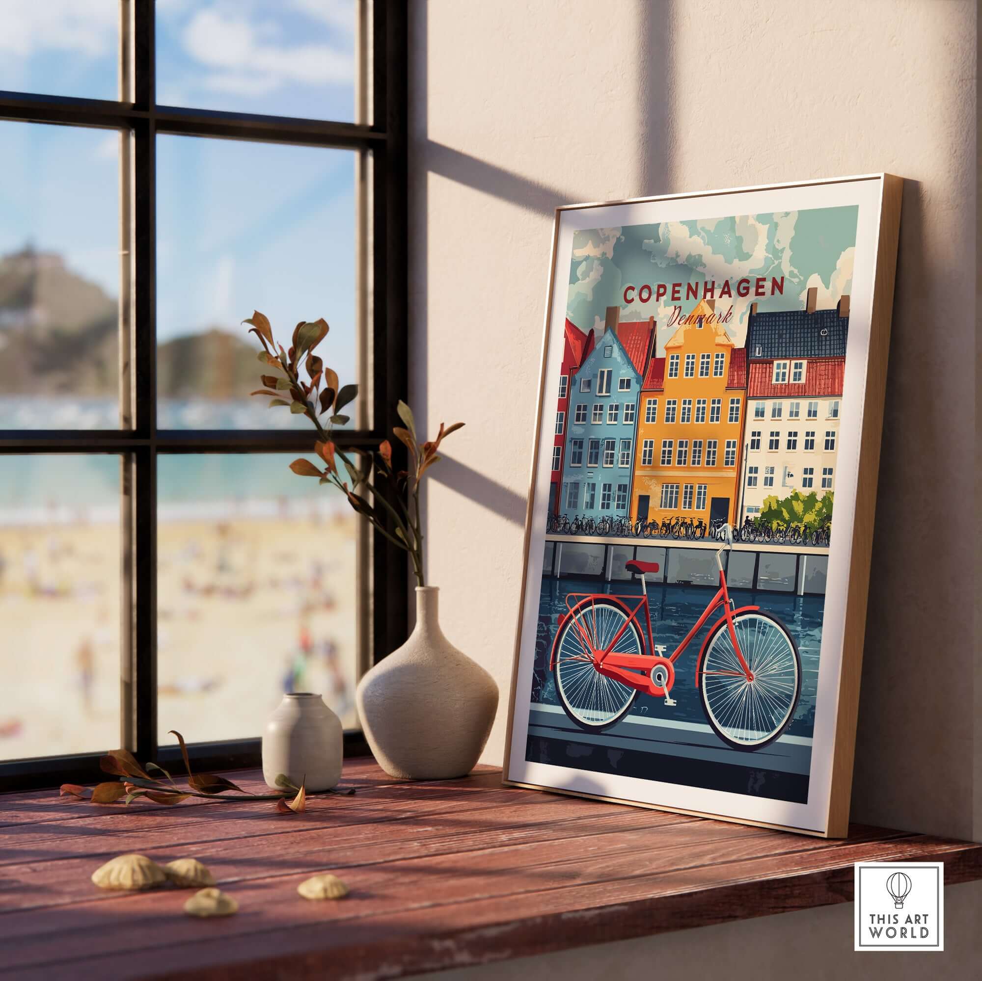 Copenhagen Denmark Art Print - Cityscape Poster, Red Bicycle Canal View displayed on a wooden table near a window.