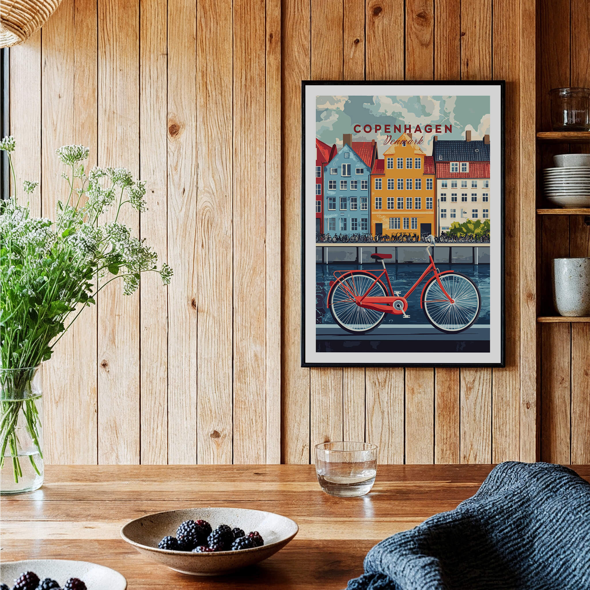 Copenhagen Denmark Art Print - Cityscape Poster, Red Bicycle Canal View framed on wooden wall with flowers.