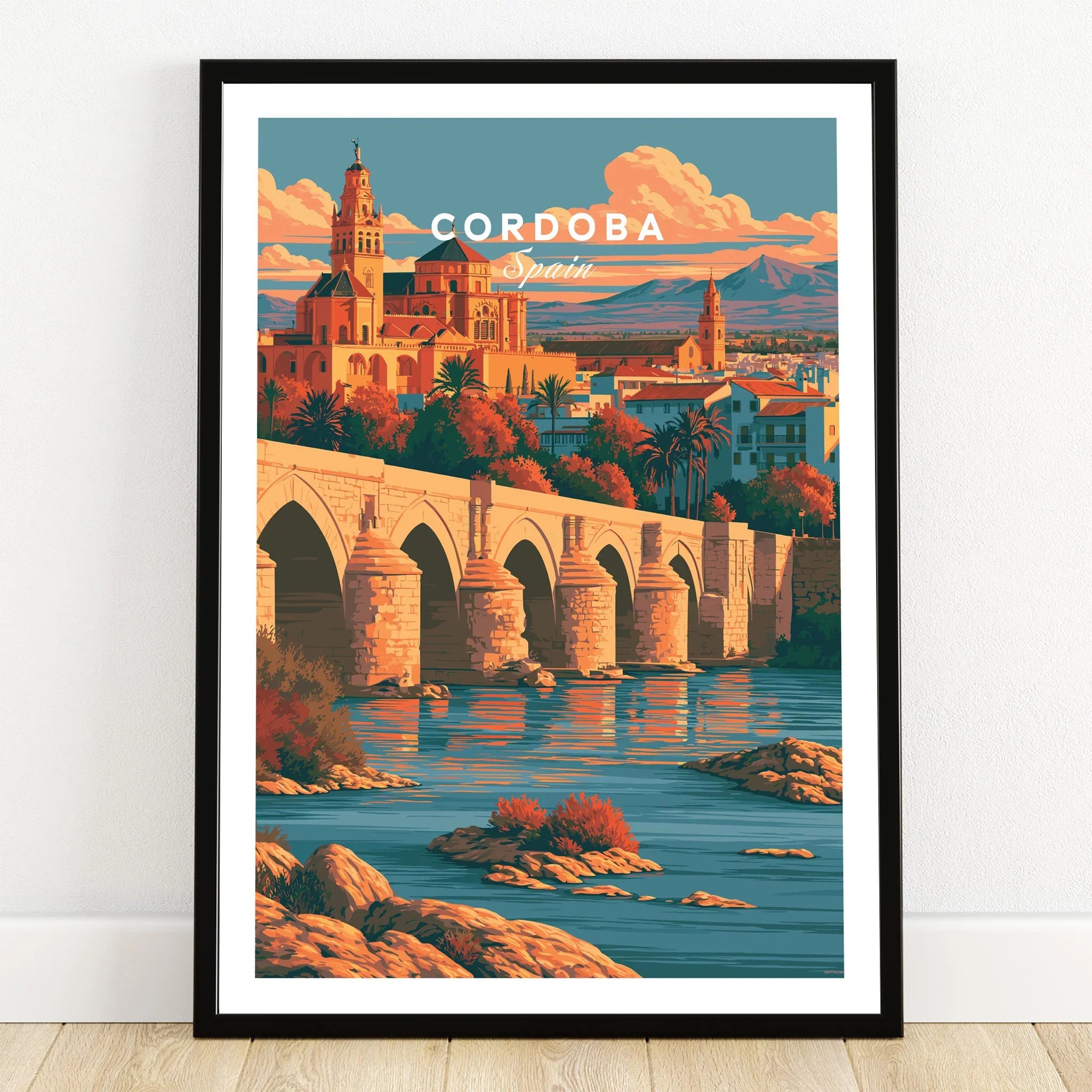 Cordoba Spain Skyline Travel Poster — art print in black frame on wooden floor
