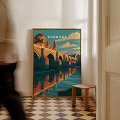 Cordoba Spain Roman Bridge Travel Poster — framed canvas on floor man walking past