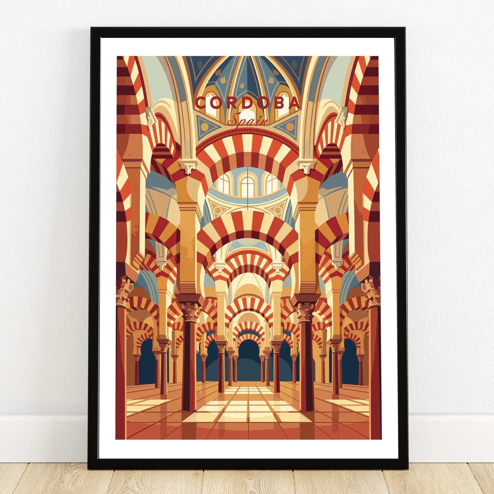 Cordoba Spain Mezquita Arches Travel Poster — art print in black frame on wooden floor