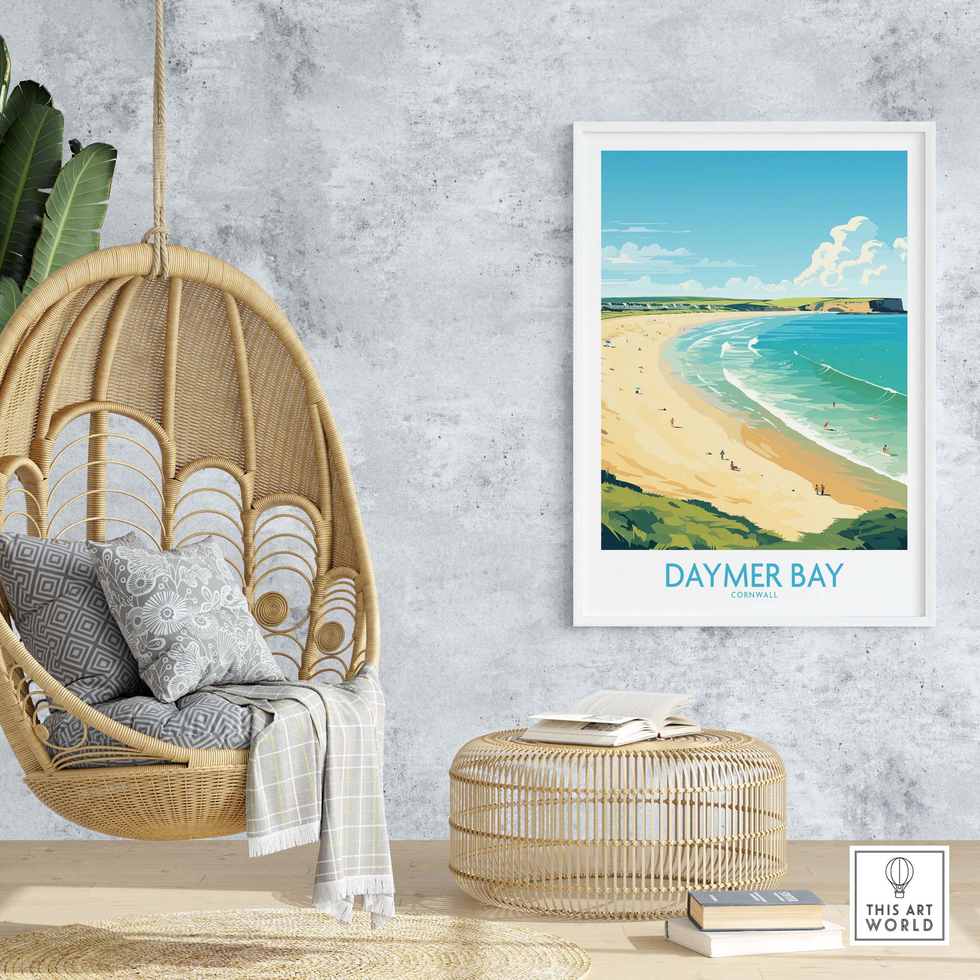 Modern Daymer Bay wall art print in a cozy living room setting with a rattan chair and decorative accents.