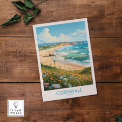 Cornwall wall art print featuring a scenic beach view with flowers in the foreground, evoking tranquility and travel memories.
