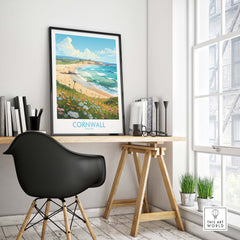 Cornwall wall art print displayed in a modern workspace, featuring a beach scene and vibrant colors, enhancing home decor.