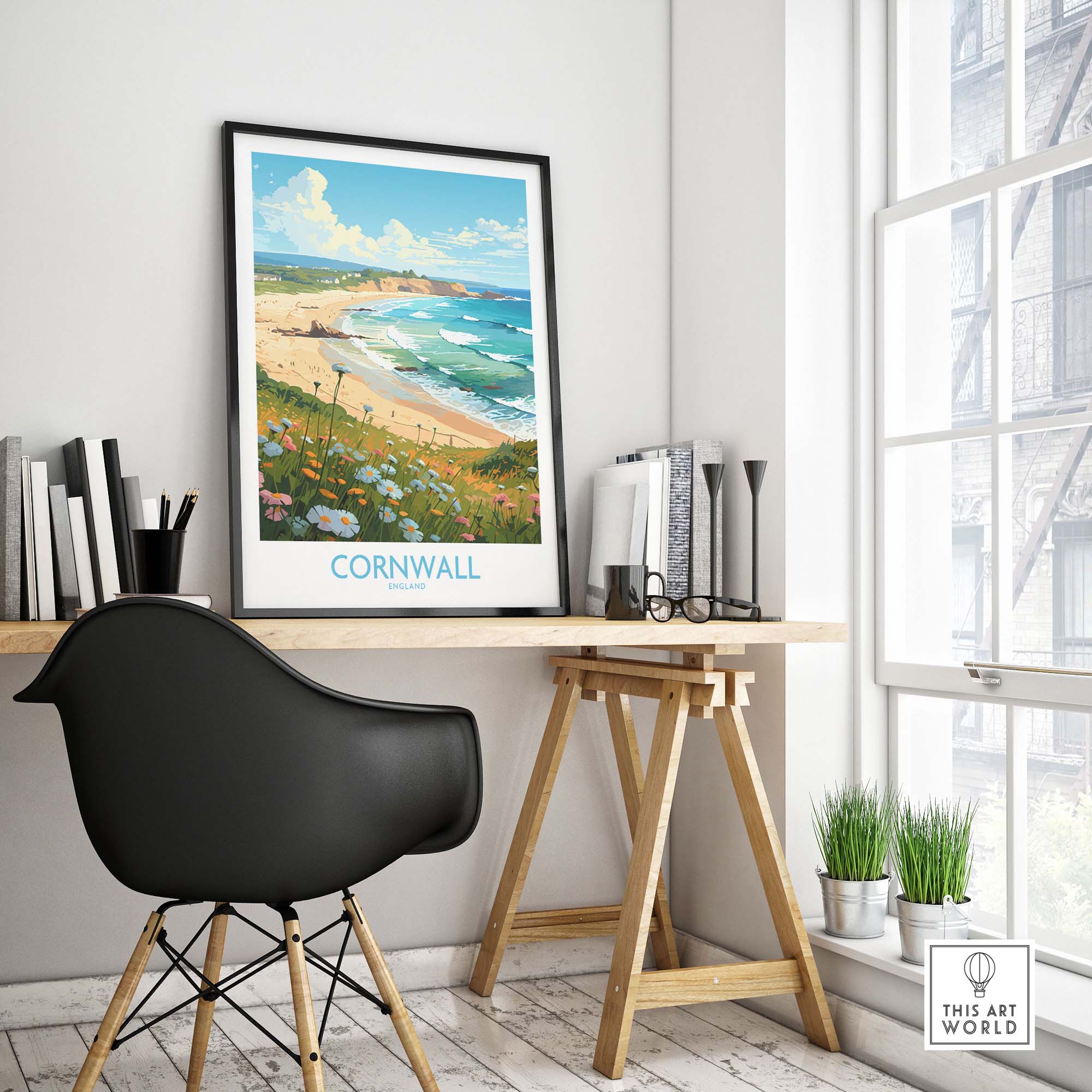 Cornwall wall art print displayed in a modern workspace, featuring a beach scene and vibrant colors, enhancing home decor.