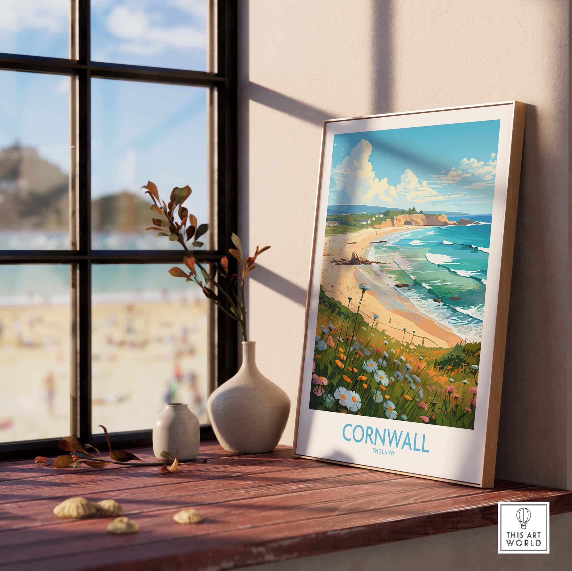 Cornwall wall art print displayed by a window, showcasing a beautiful coastal scene and vibrant flowers, perfect for home decor.