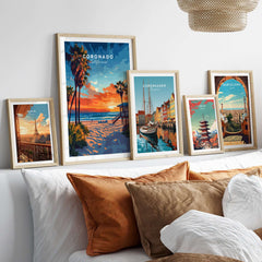 Coronado Print California showcased among framed prints of Copenhagen and Barcelona in a stylish living room decor.