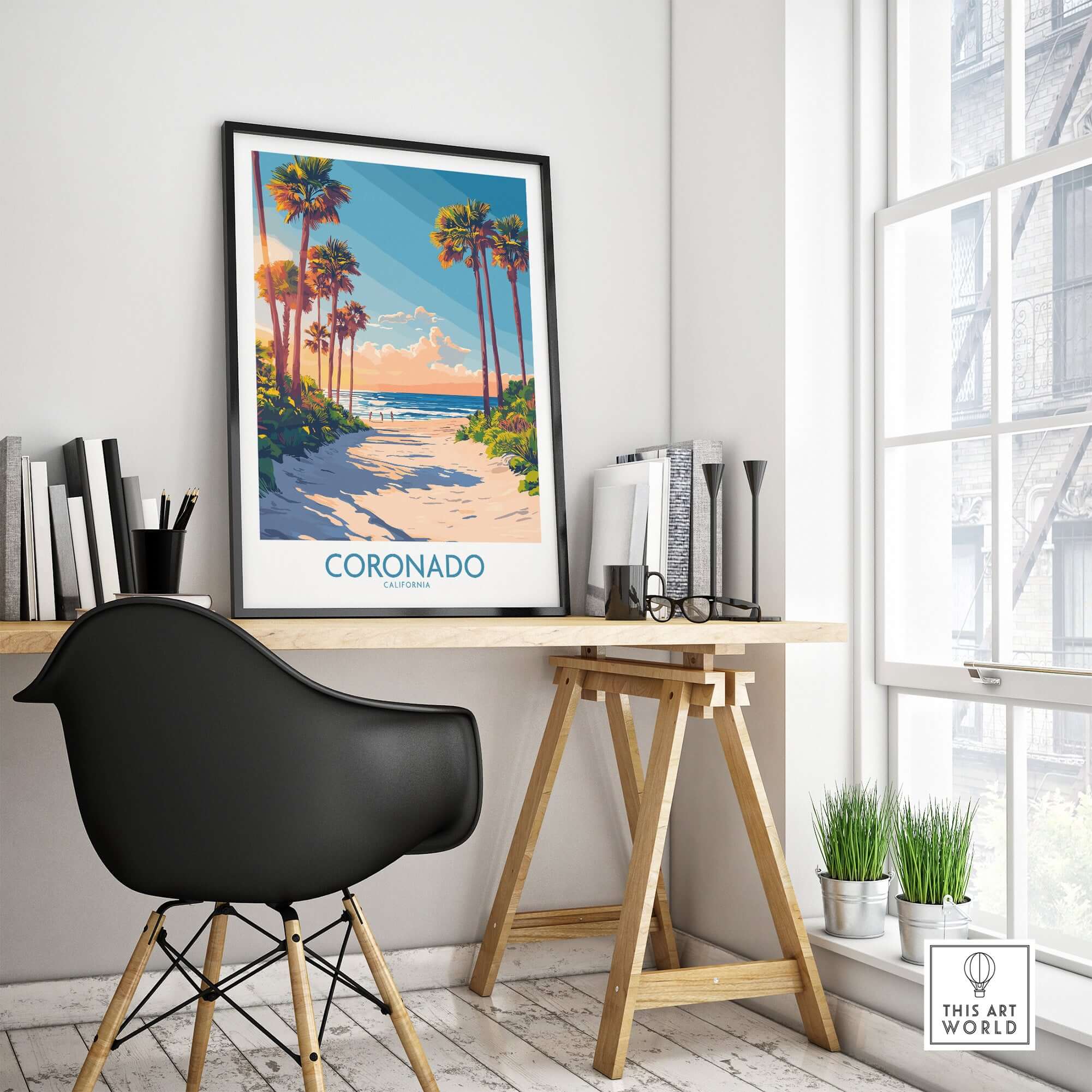 Coronado Travel Poster displayed in a stylish workspace, showcasing idyllic beach scenery and palm trees.