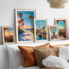 Coronado Travel Print showcasing beautiful beach scenery framed alongside travel prints of Copenhagen and Barcelona