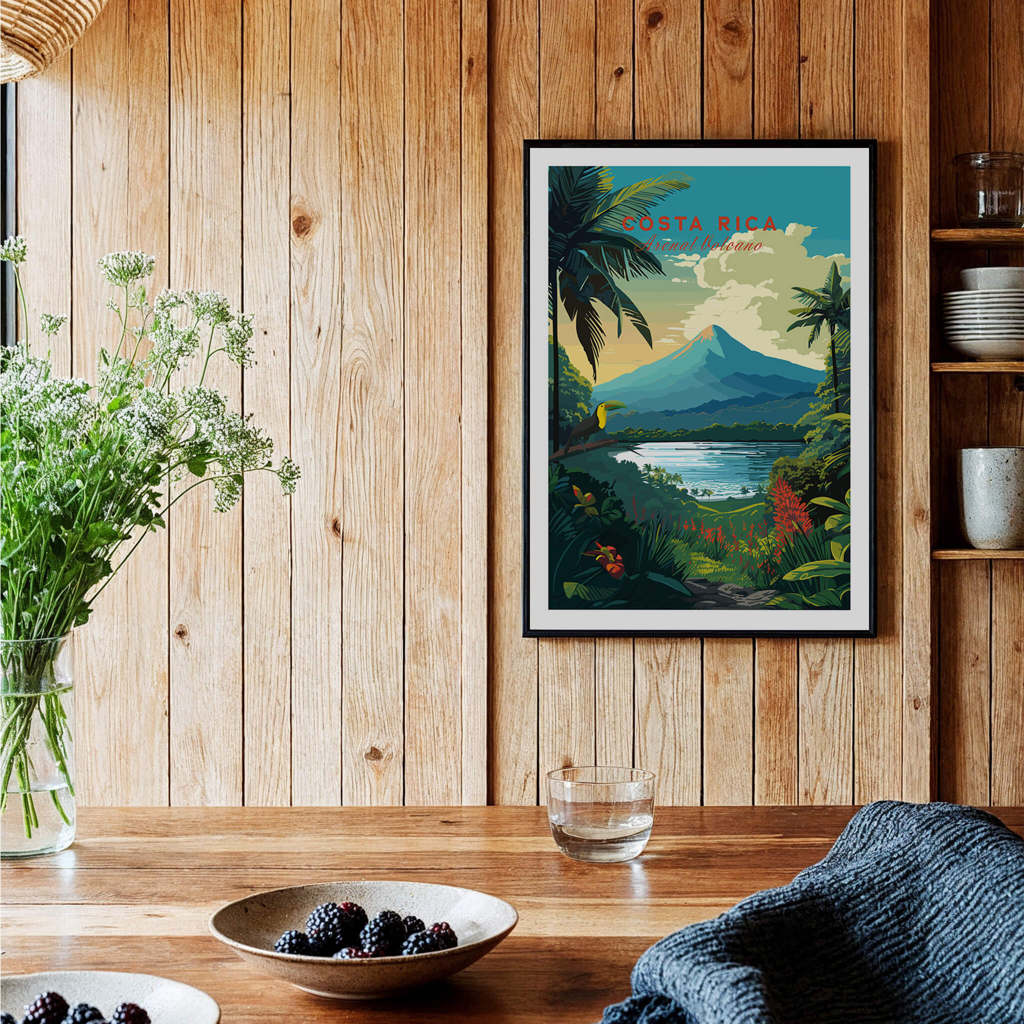 Costa Rica Print featuring Arenal Volcano and tropical landscape in vibrant colors on wooden wall.