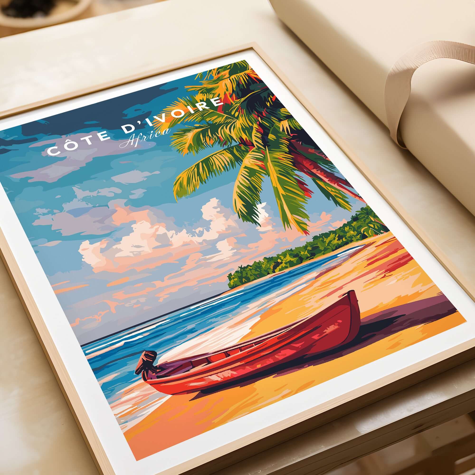 Côte d'Ivoire Beach Poster - African Art Print, Ivory Coast Scenery featuring a red boat on a sandy beach with palm trees.