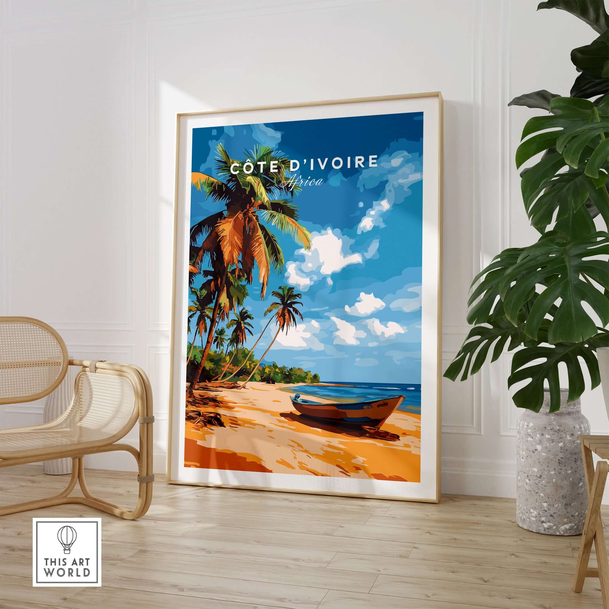 Côte d'Ivoire Poster Africa featuring a serene beach scene with tropical plants and a boat, perfect for home decor.