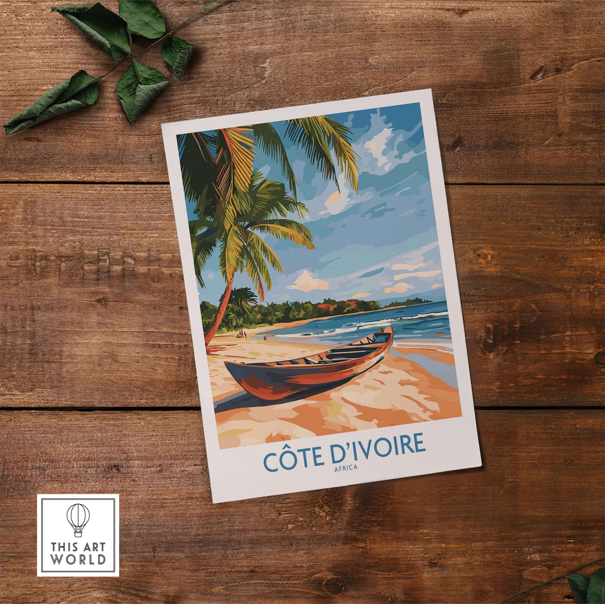 Côte d'Ivoire Travel Print featuring a serene beach scene with palm trees and a canoe on the sand.