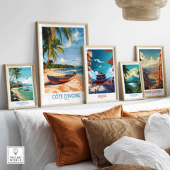 Côte d'Ivoire Travel Print framed among other travel prints, showcasing vibrant beach scenes and landscapes.