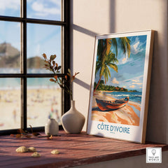 Côte d'Ivoire Travel Print showcasing a beach scene in a home setting with decor.