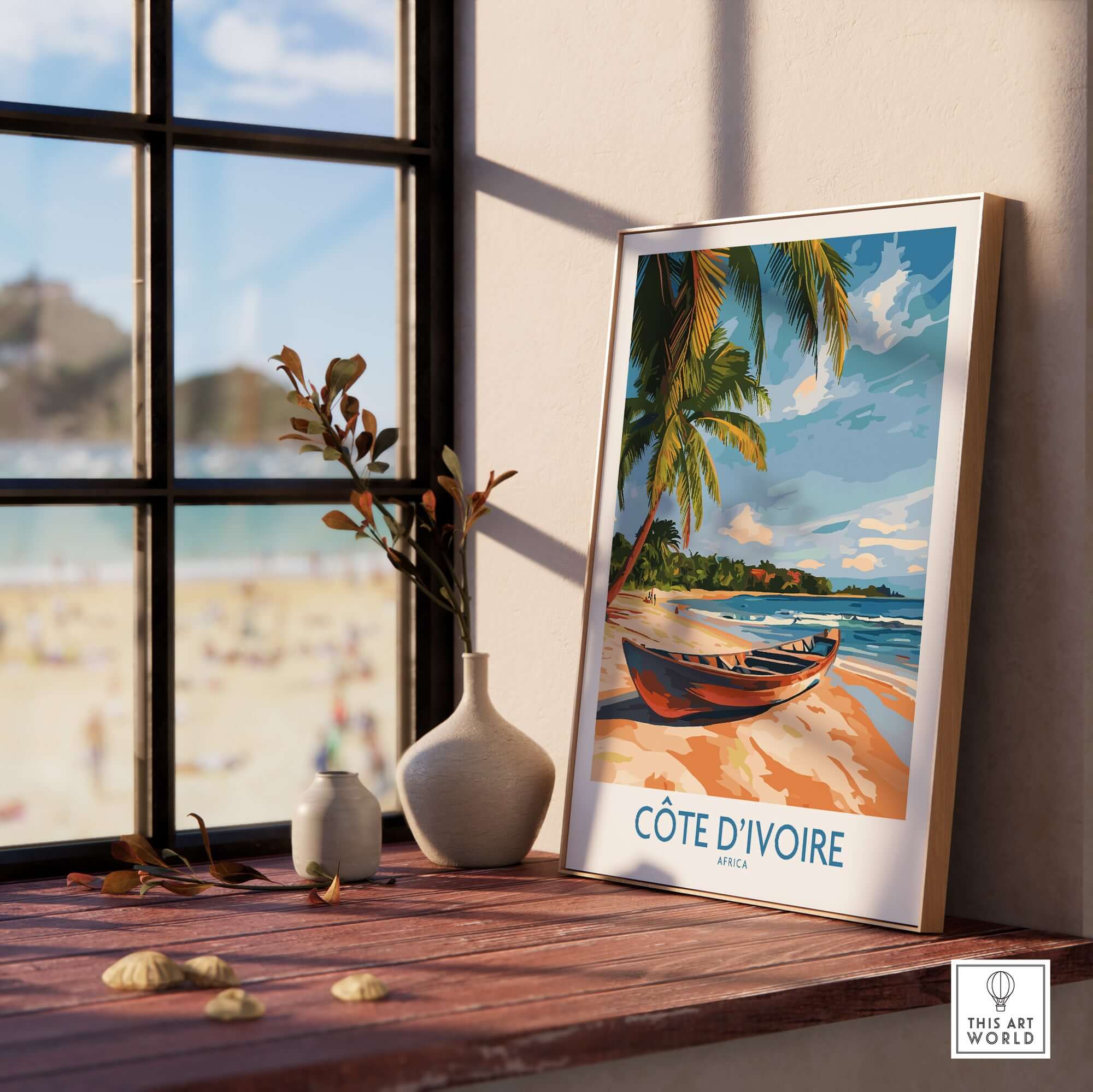 Côte d'Ivoire Travel Print showcasing a beach scene in a home setting with decor.