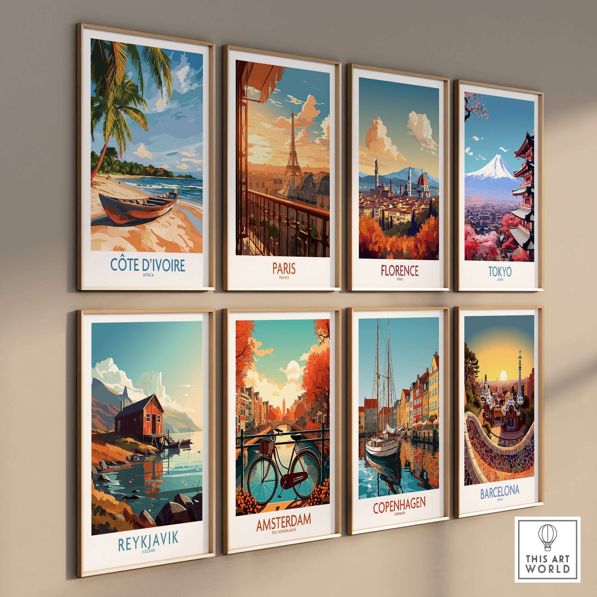 Côte d'Ivoire Travel Print and other city-themed travel prints displayed on a wall.