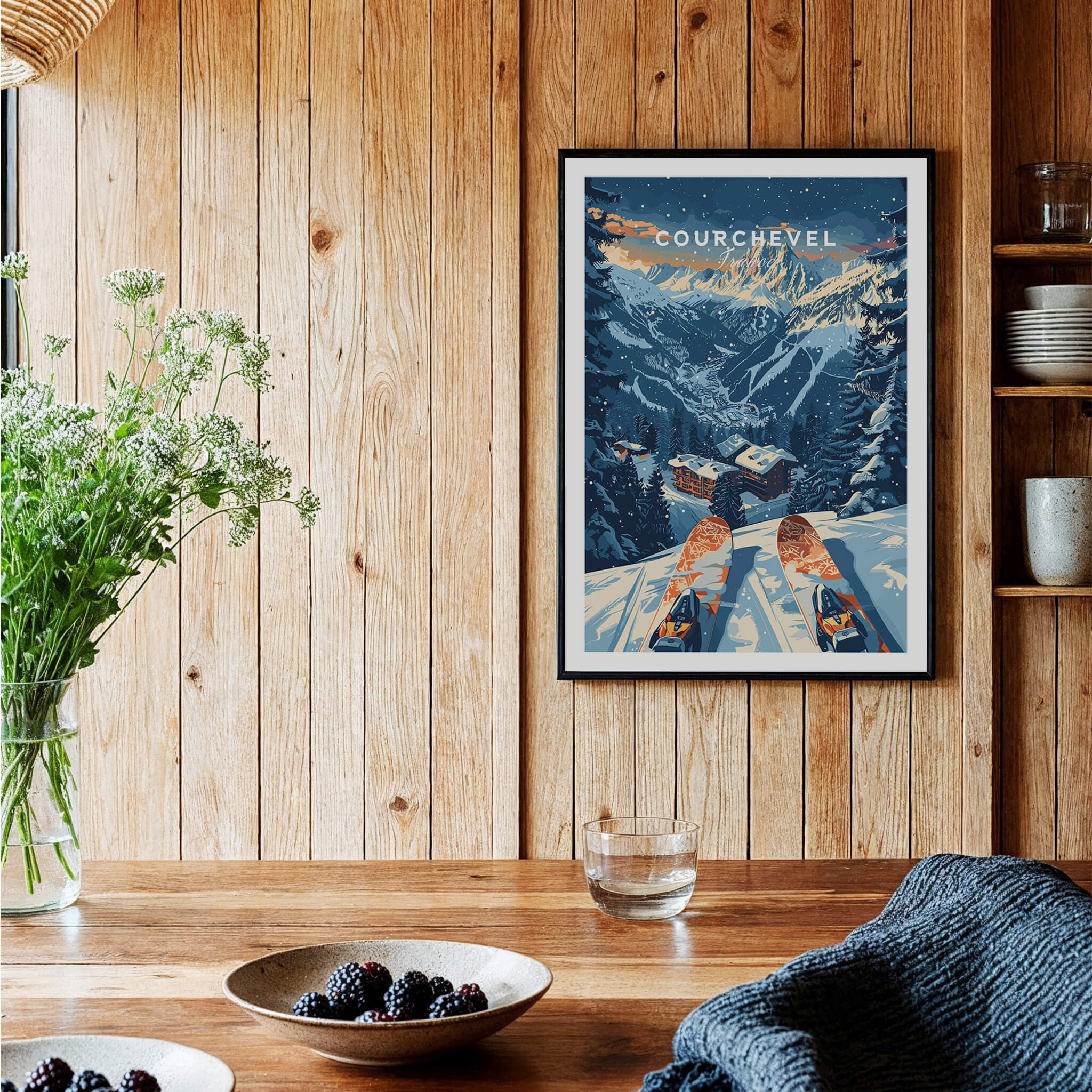 Courchevel Print France ski poster displayed in a cozy wooden interior, showcasing the stunning French Alps.