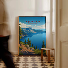 Crater Lake National Park travel poster in frame on checkered floor, man walking past.