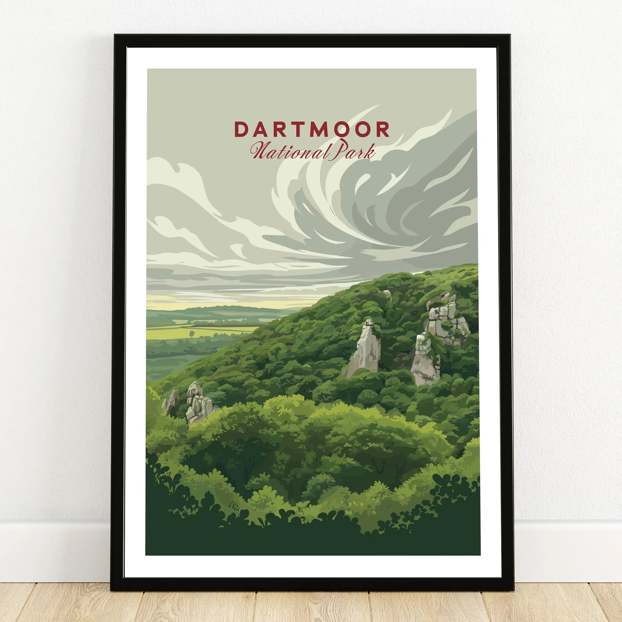 Dartmoor National Park Moorland Travel Poster — art print in black frame on wooden floor