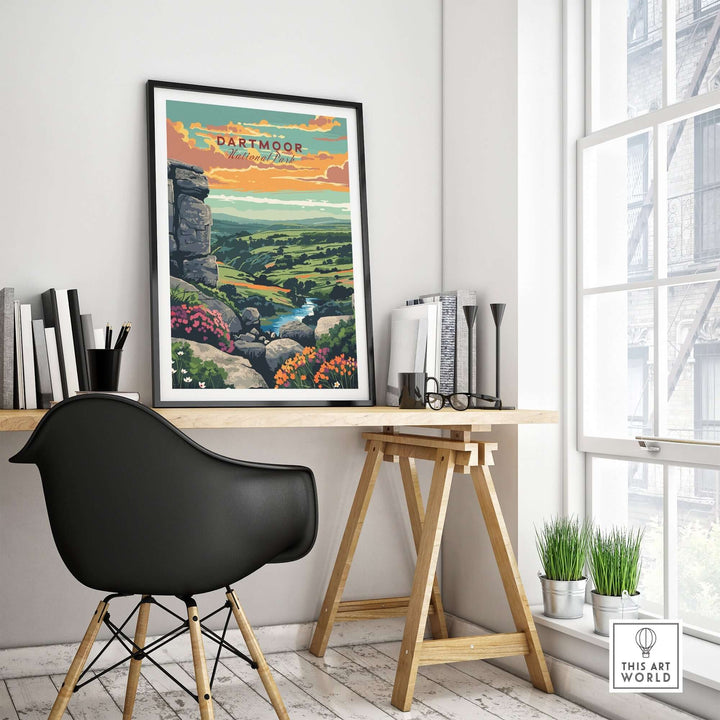 Dartmoor National Park Print displayed in a modern workspace, highlighting rugged landscapes and vibrant colors.