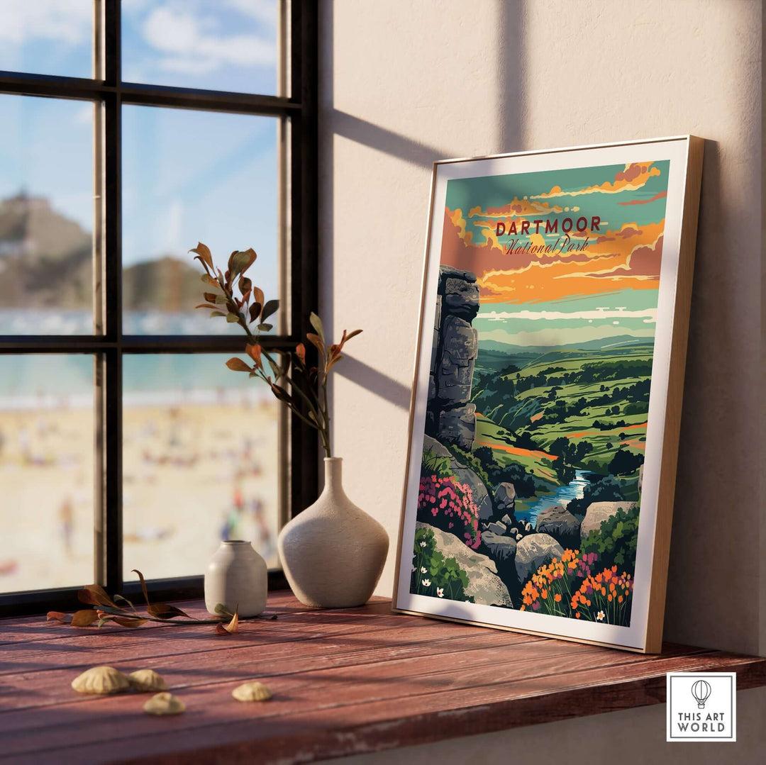 Dartmoor National Park print displayed on a sunlit windowsill, showcasing vibrant landscapes and scenic beauty.