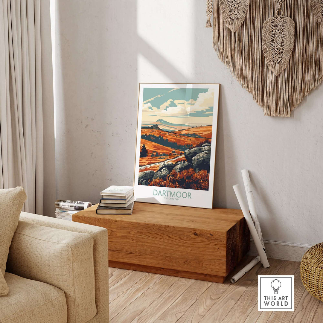 Dartmoor National Park poster displayed in a cozy living room setting, showcasing beautiful landscapes and warm colors.