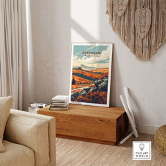 Dartmoor Art Print displayed in a cozy living room setting with natural decor elements.