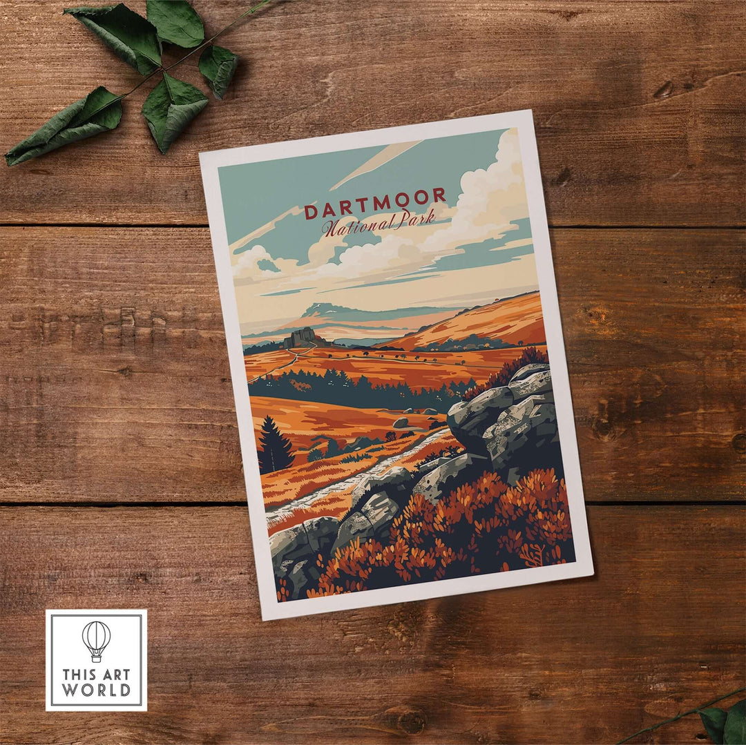 Dartmoor National Park poster featuring a vibrant landscape with hills and rocky terrain, set on a rustic wooden table.