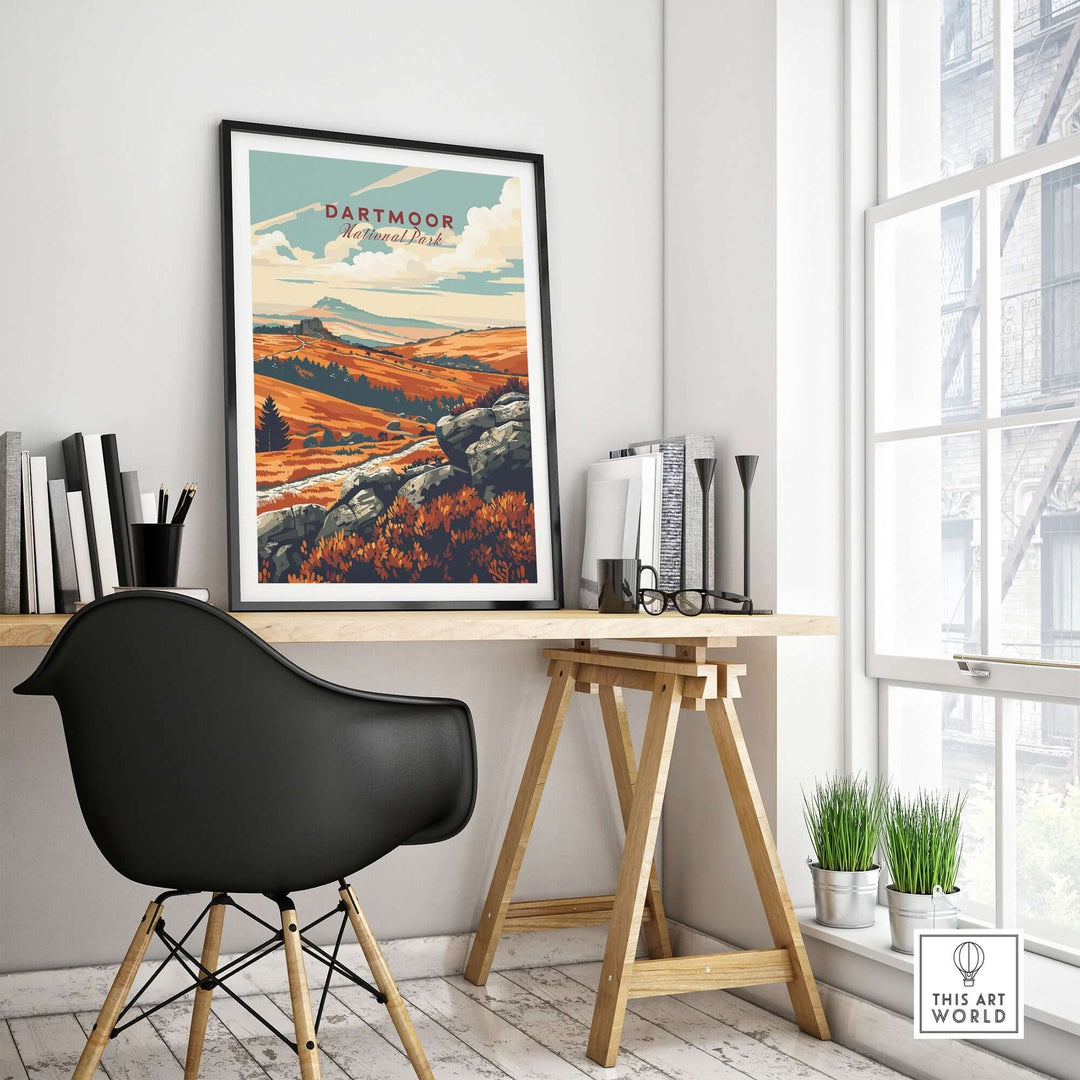 Dartmoor National Park poster displayed in a modern home office setting, showcasing vibrant landscape art.