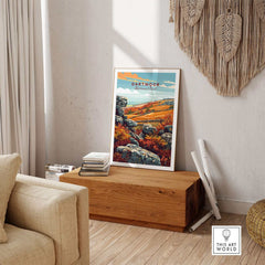 Dartmoor Poster National Park displayed in a cozy living room, showcasing beautiful landscapes and vibrant colors.