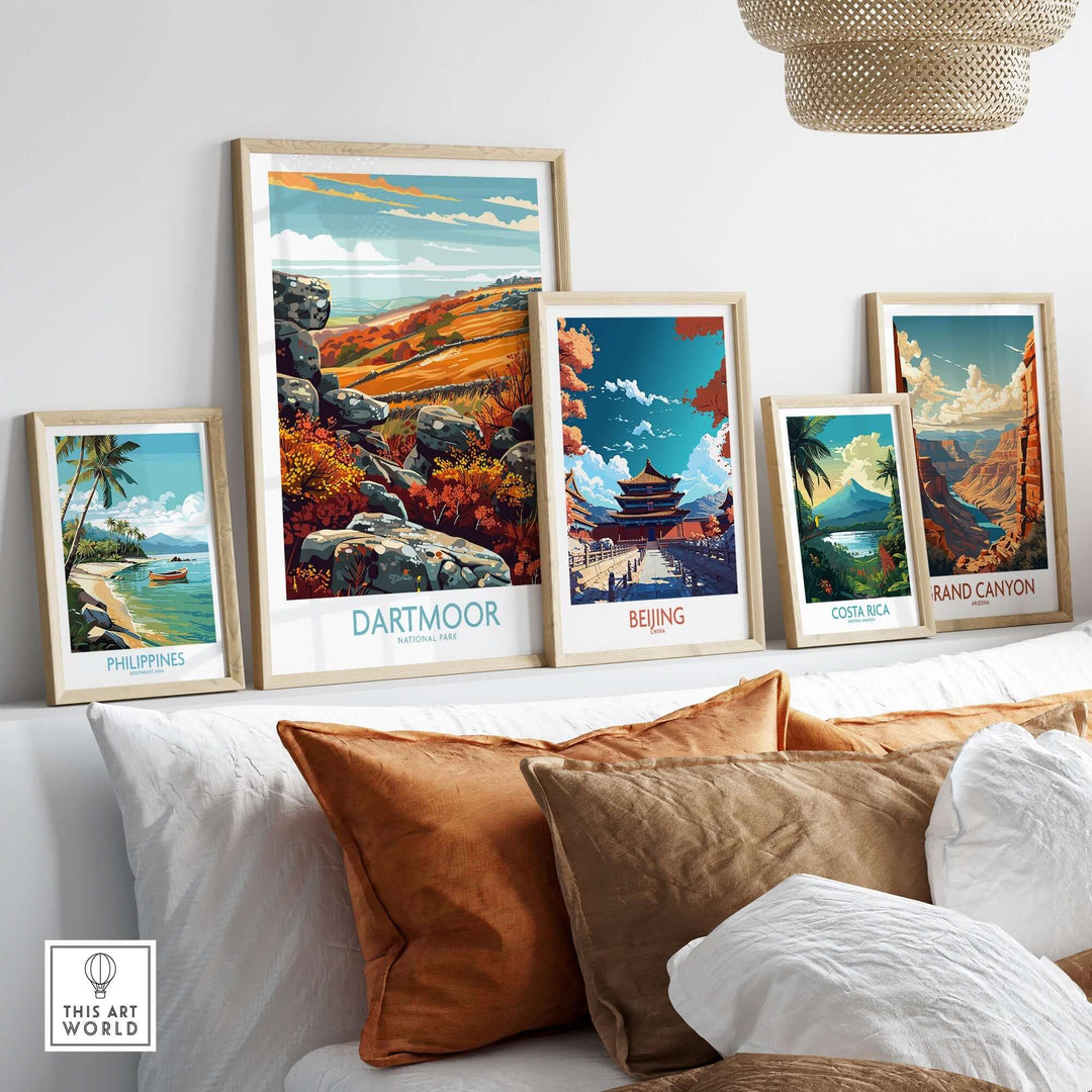 Framed prints of Dartmoor, Philippines, Beijing, Costa Rica, and Grand Canyon displayed on a stylish shelf in a cozy living room.